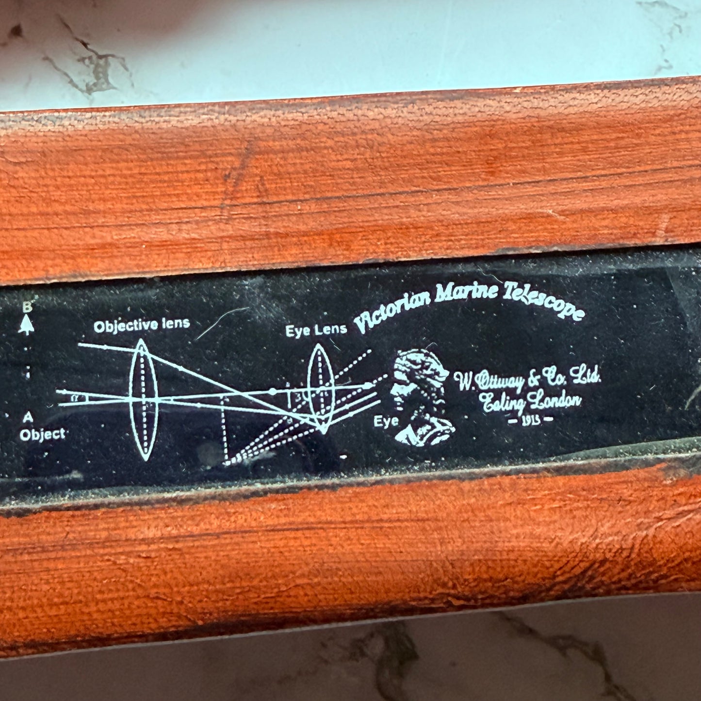 Leather Victorian Marine Telescope with engraved details and branding.