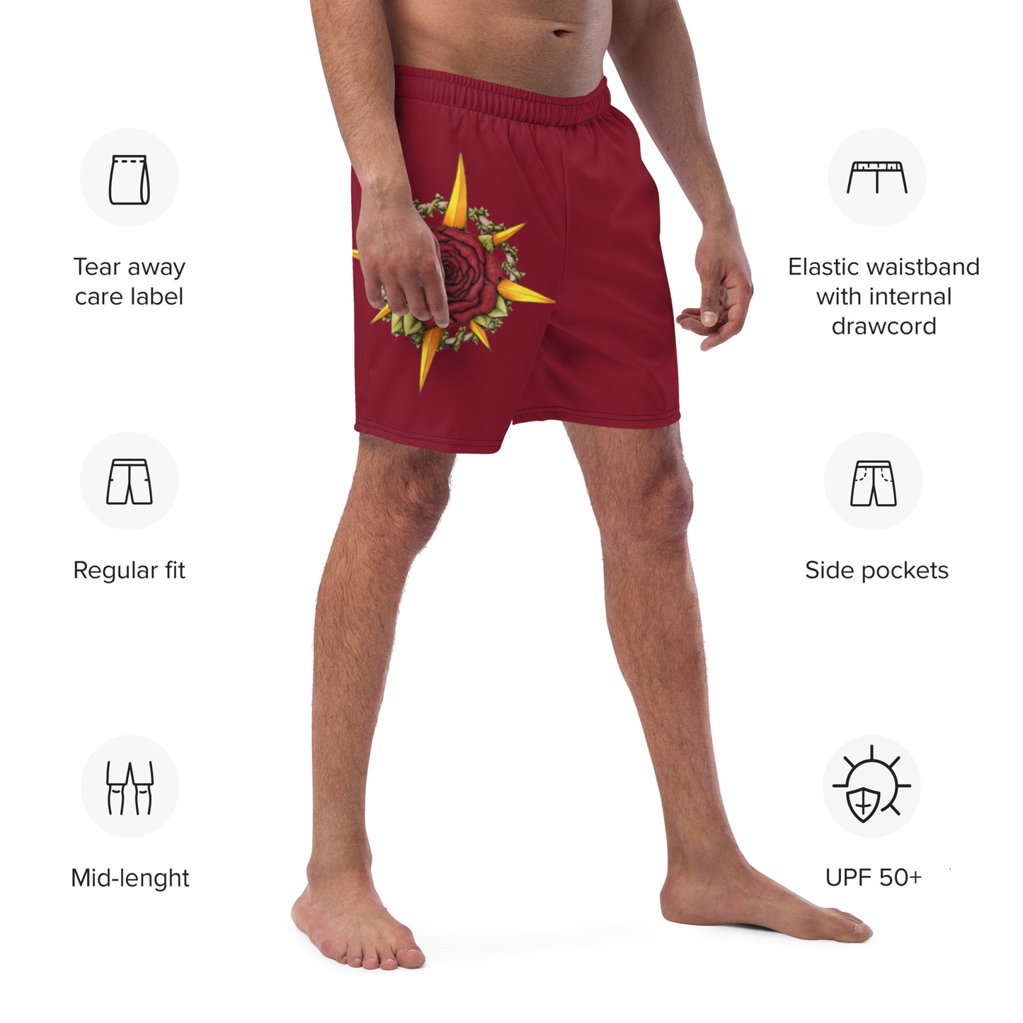 A model wears red swim trunks with the Druid Compass Rose illustration by Deven Rue, surrounded by product specifications.