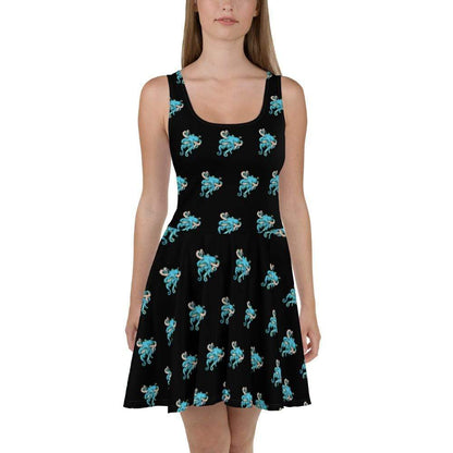 A model wears a skater style dress with small blue octopi all over it.
