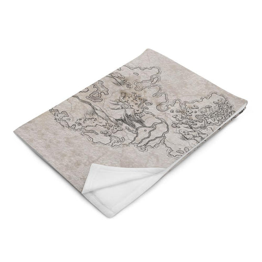The Vendras map by Deven Rue is printed on a minky blanket, folded up.