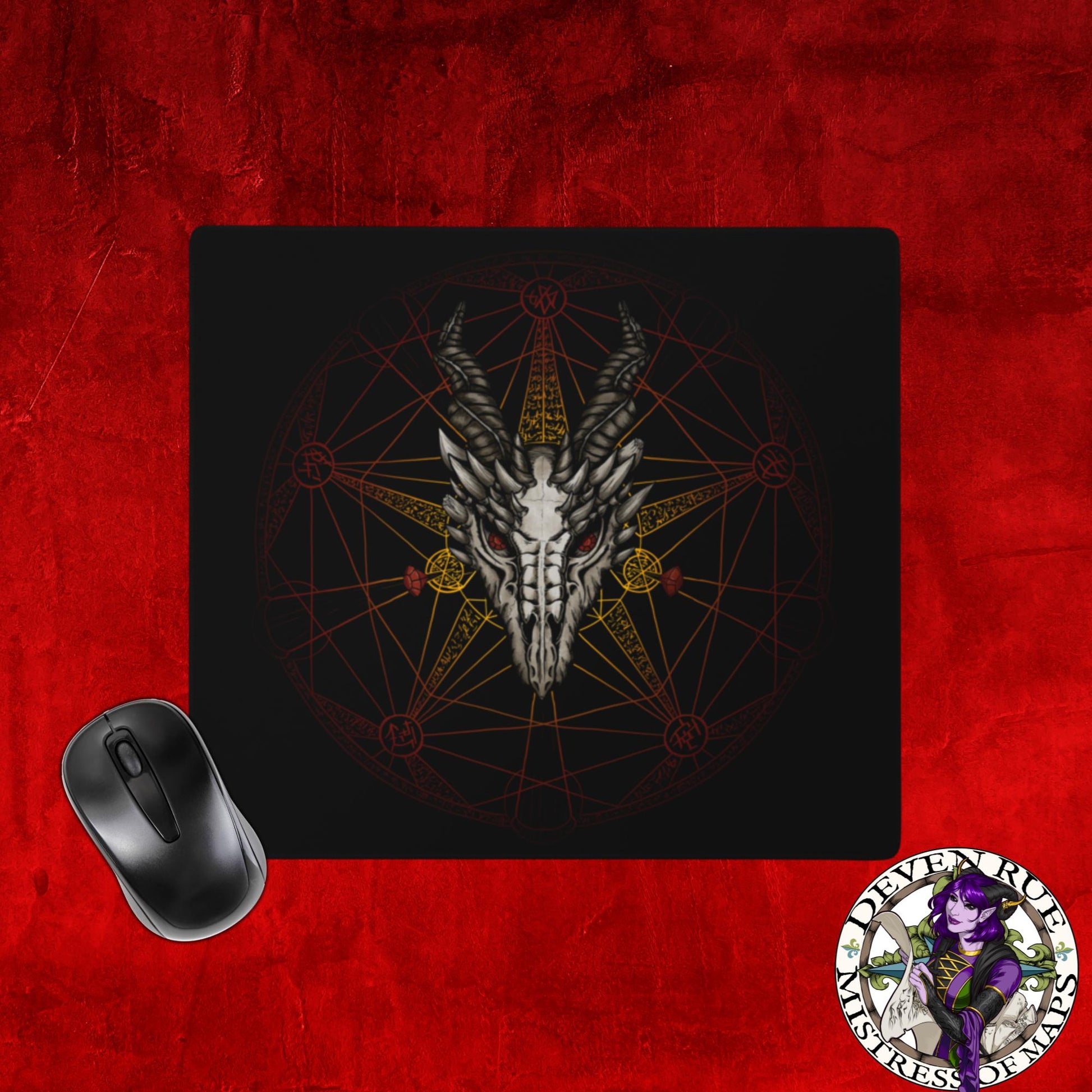 The smaller gaming mouse pad (18x16") with the red dragon summoning circle on it.