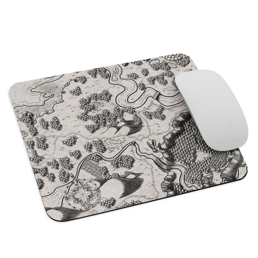 The black and white Humble Beginnings regional map made into a mousepad with a mouse for scale.