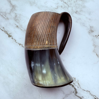 Curved-handled horn mug 