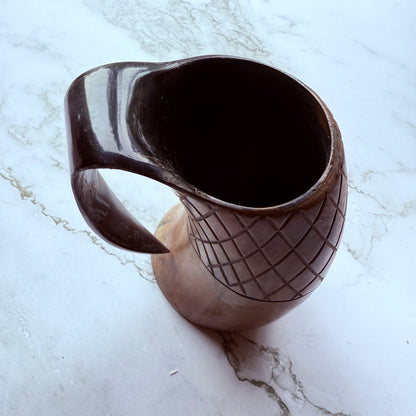 Detail photo looking into the mouth of the drinking horn