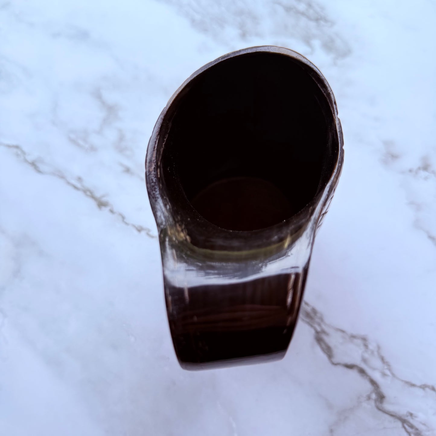 Detail photo looking into the mouth of the drinking horn