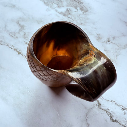 Detail photo looking into the mouth of the drinking horn