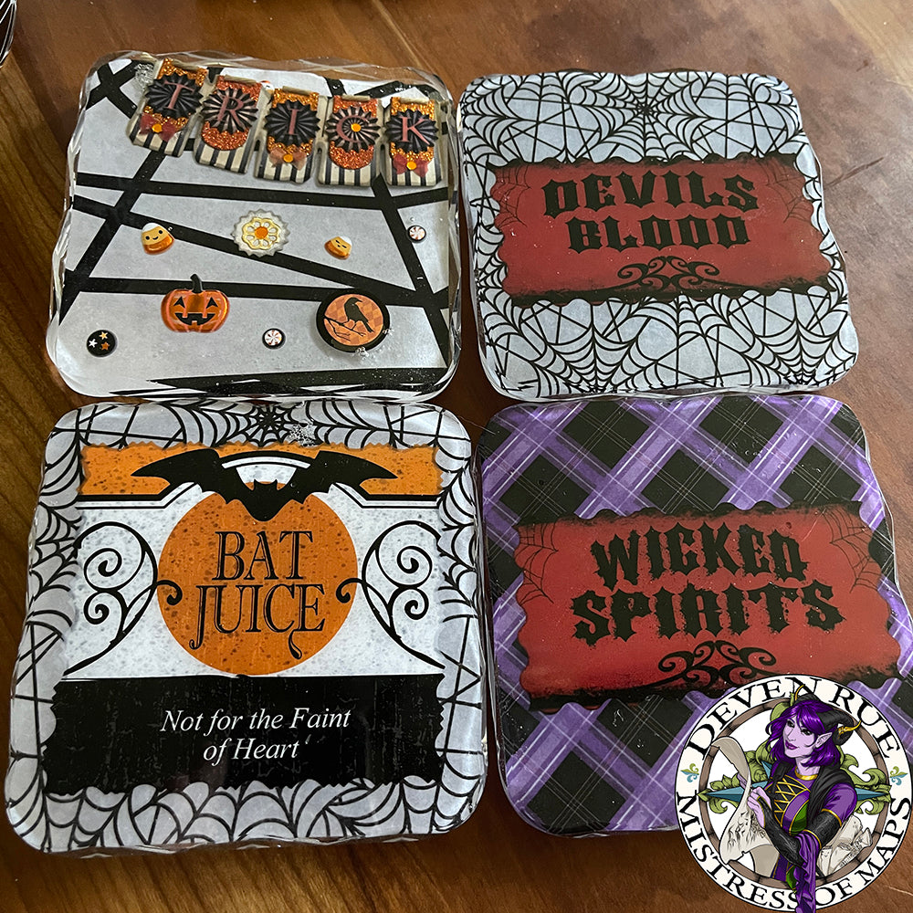 The set of four Halloween themed coasters.