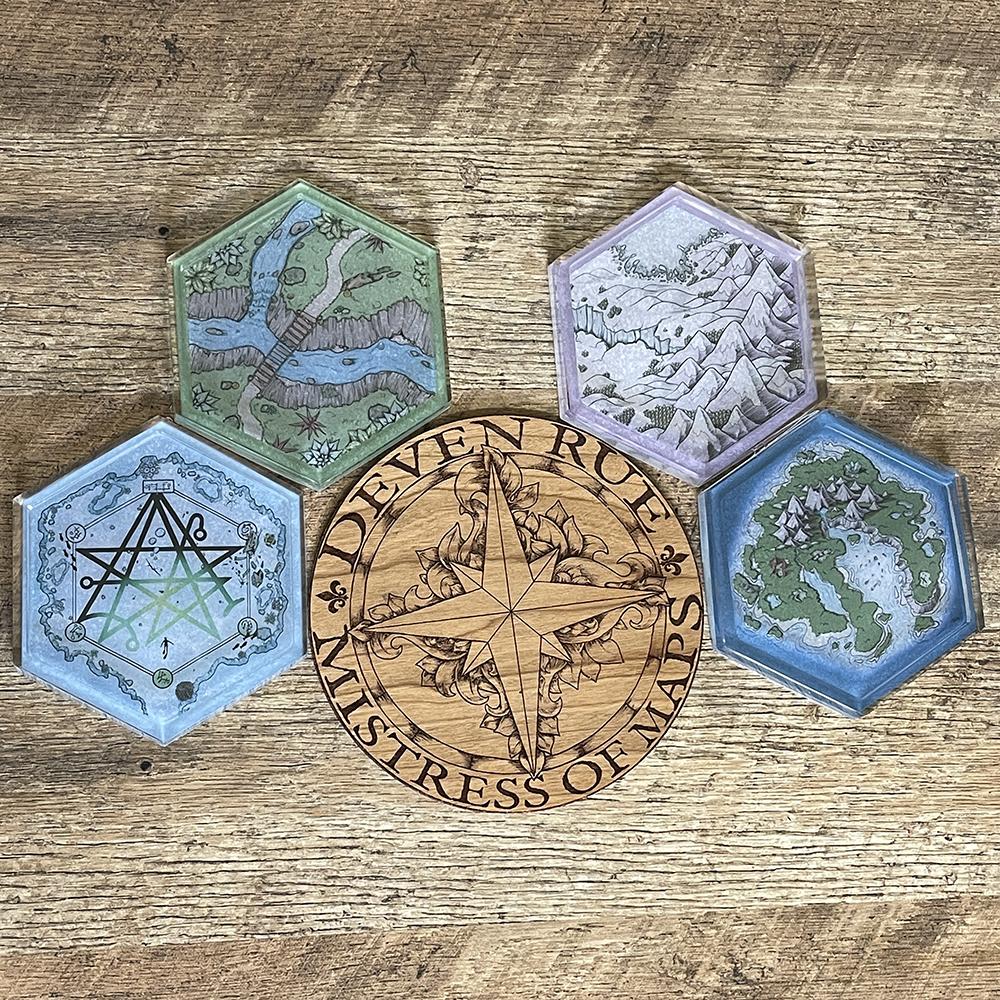 A set of four Hex Map coasters featuring different maps by Deven Rue.