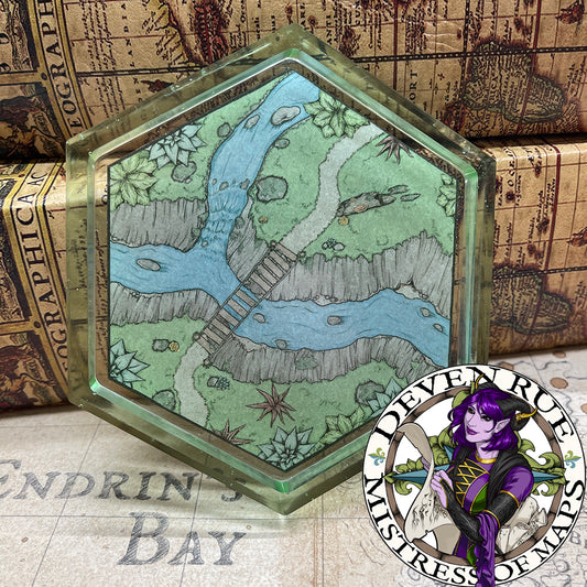 A hexagonal coaster with the Perilous Crossing Hex map.