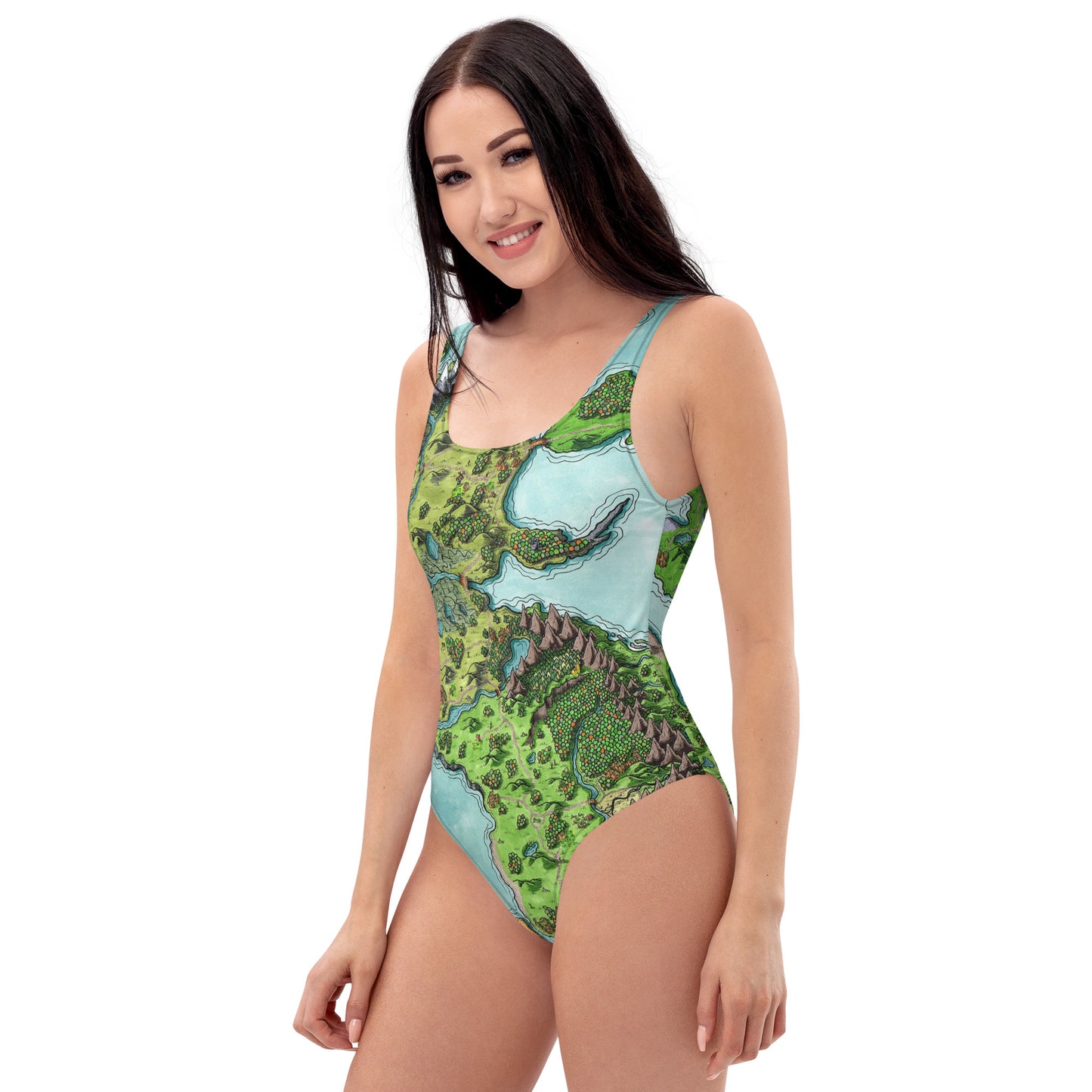 A model wears the Euphoros one piece swimsuit by Deven Rue, left view.