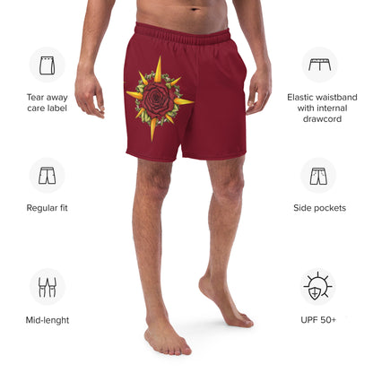 A model wears red swim trunks with the Druid Compass Rose illustration by Deven Rue, surrounded by product specifications.