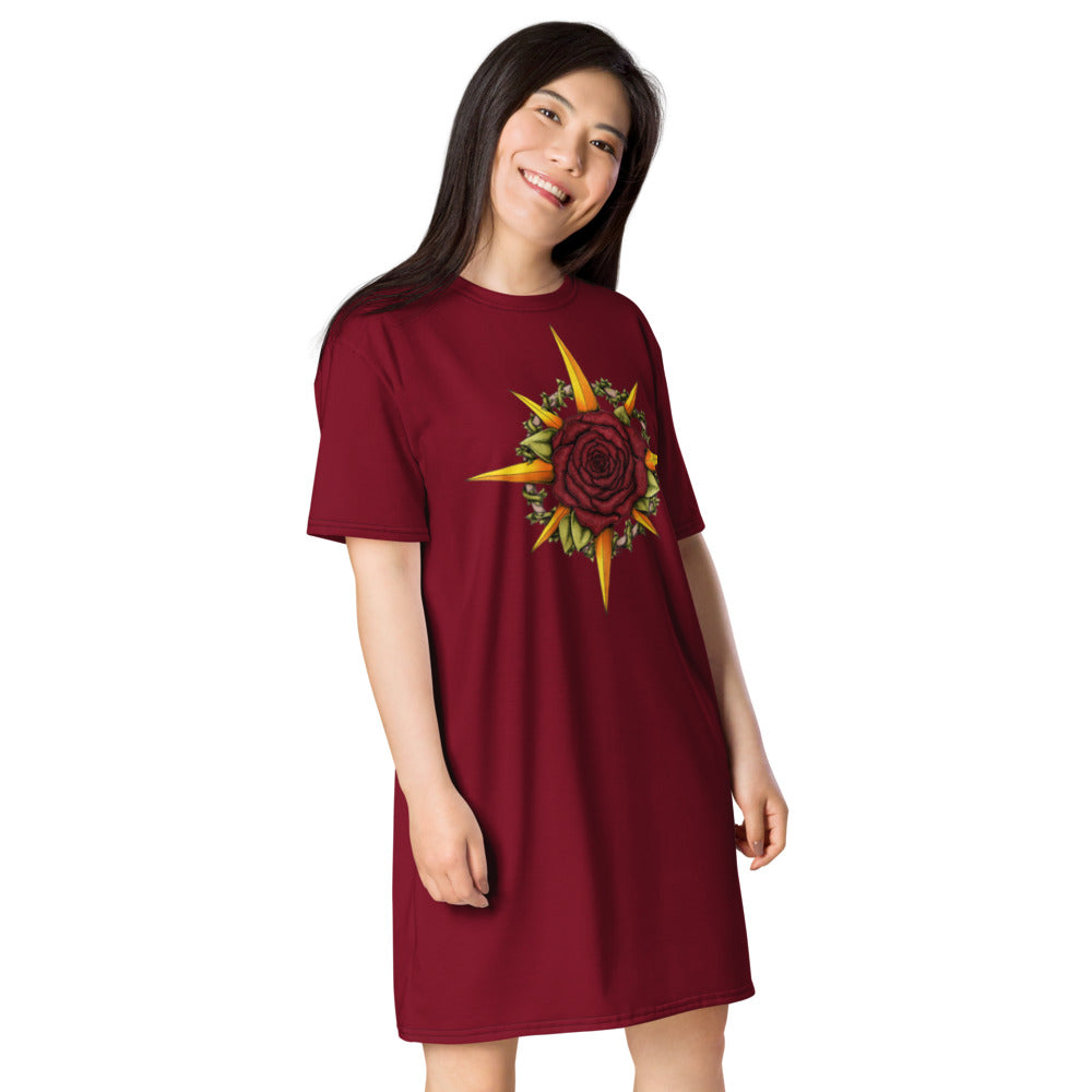 A model wears a burgundy t-shirt dress with the Druid Compass Rose illustration on the front.