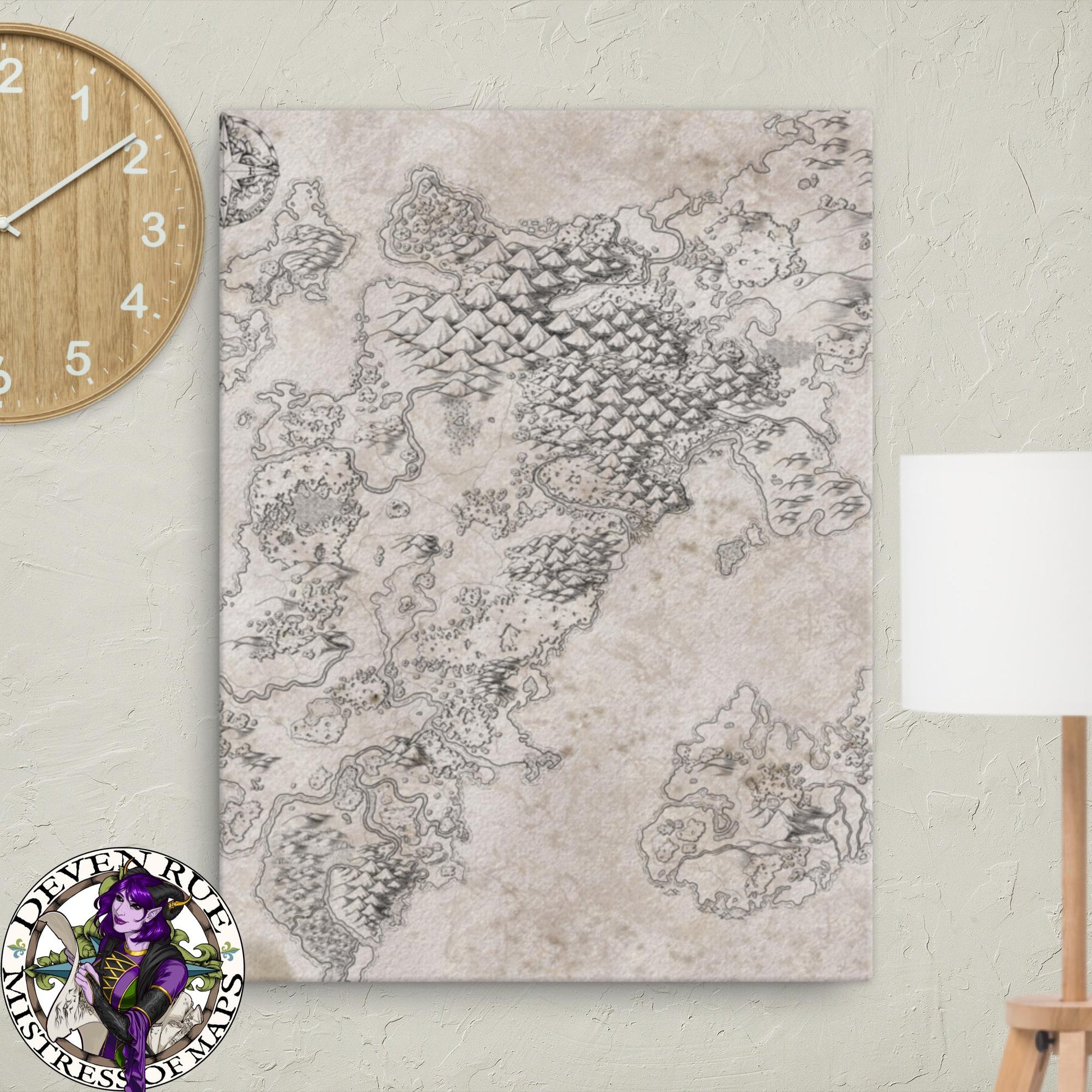 A 18" by 24" canvas print of the Wallerfen map by Deven Rue hangs on a wall between a lamp and a clock.