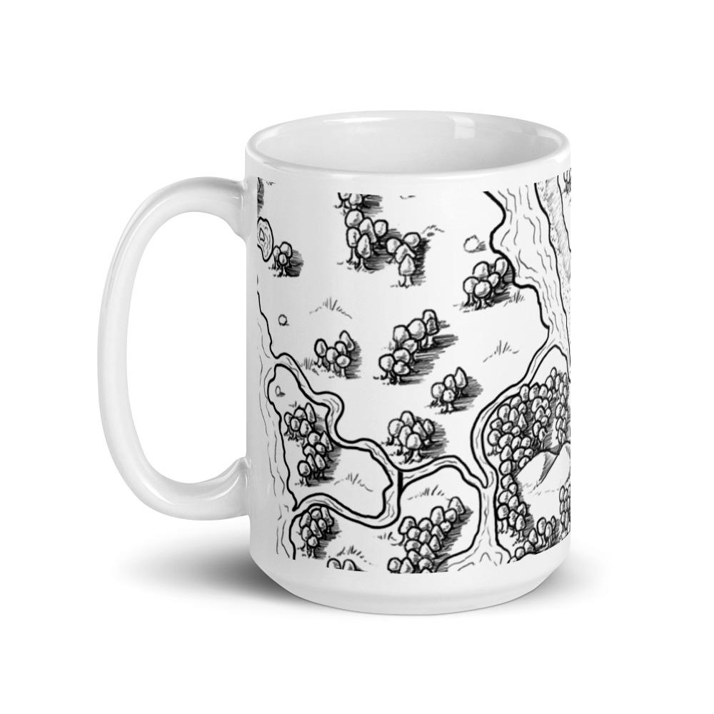 A black and white map of a cliffside meadow by Deven Rue wraps around a white mug.