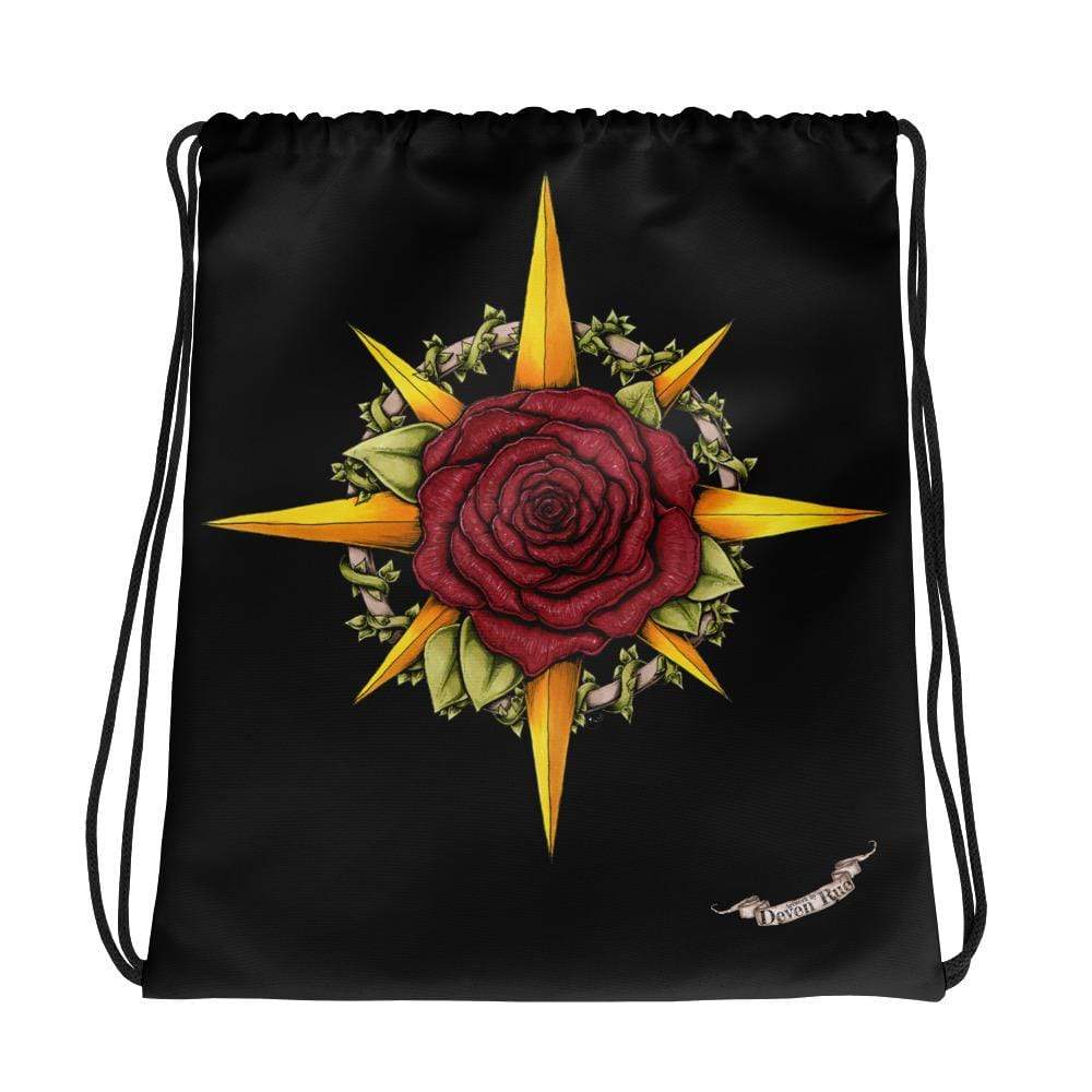 A black drawstring bag with the Deven Rue compass rose with a rose in the middle.