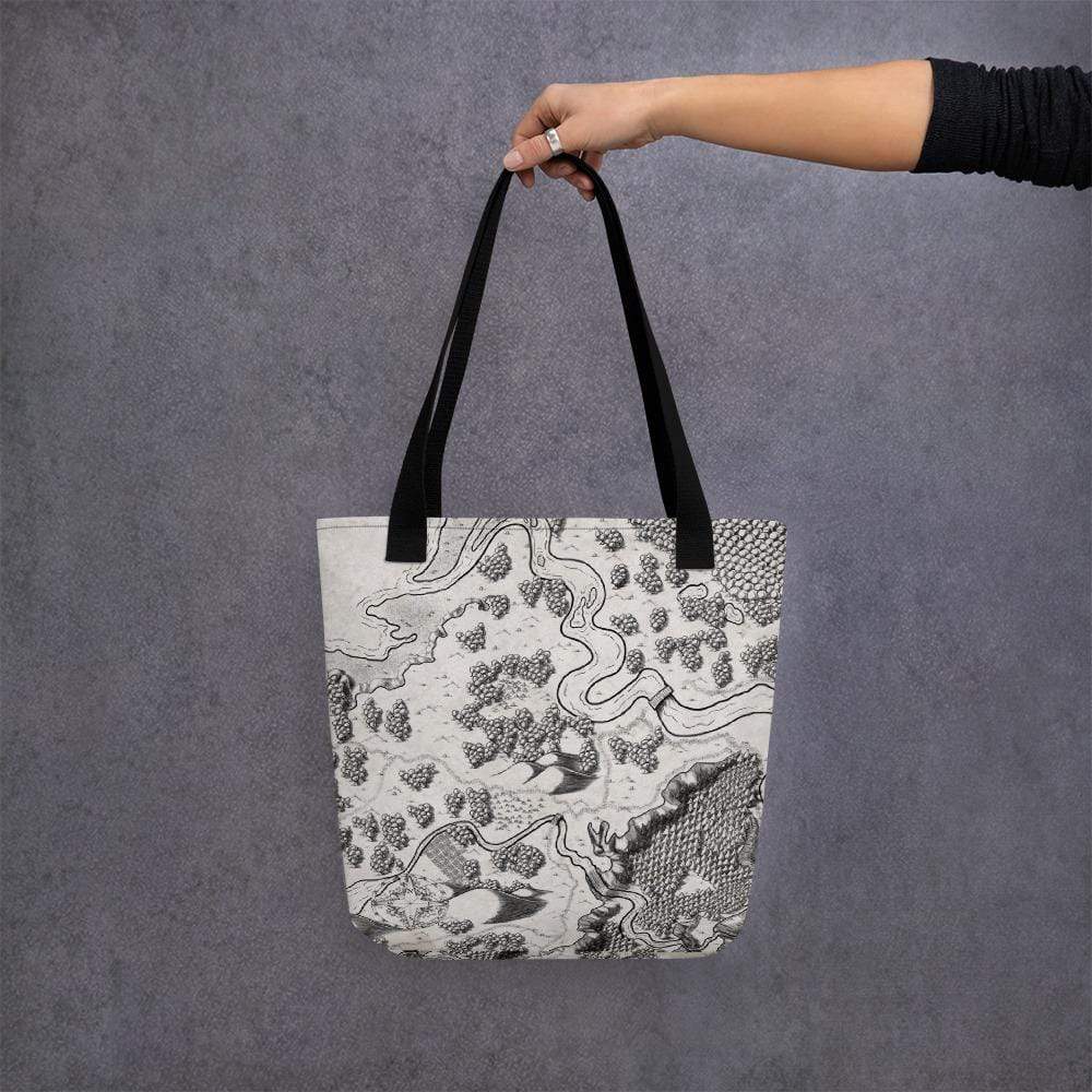 A tote bag with a black and white map illustration and black straps.