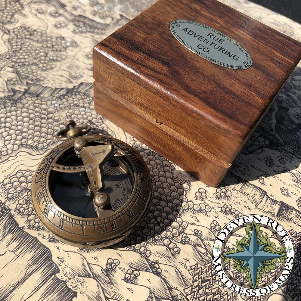 Another angle of the compass and sundial next to the box on the map.
