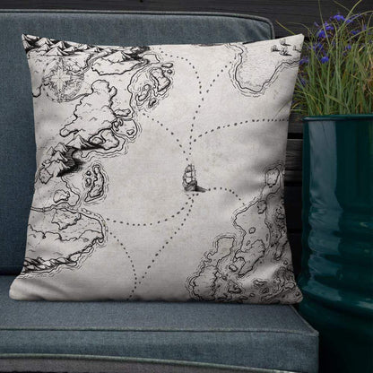 Sailing into the Unknown Pillow by Deven Rue on a couch.