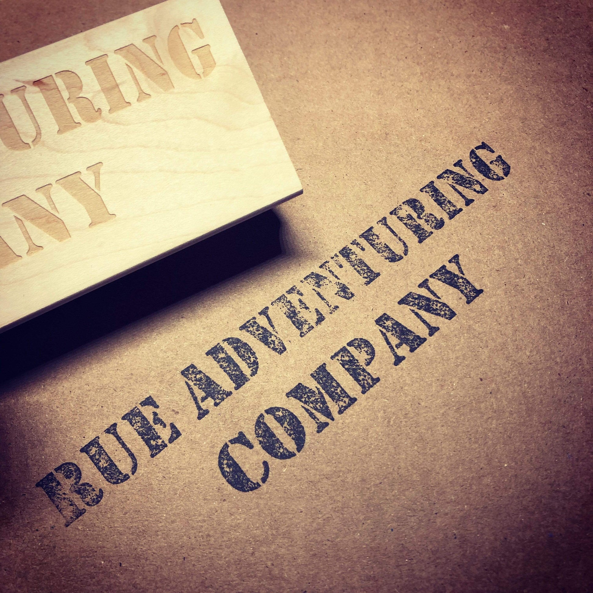 A stamp for Rue Adventuring Company.