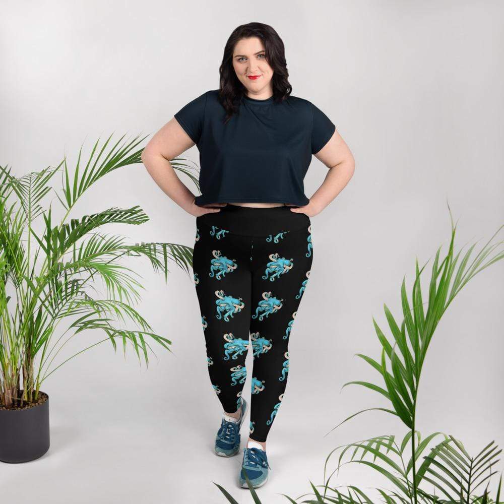 A model wears black leggings with small blue octopi all over them.