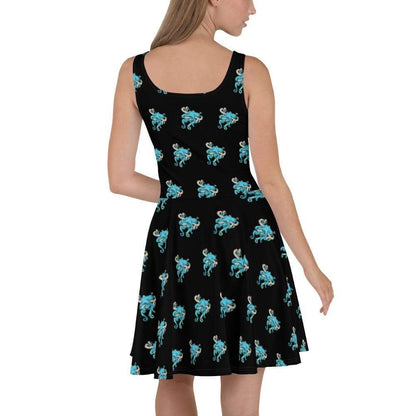 Back view: A model wears a skater style dress with small blue octopi all over it.