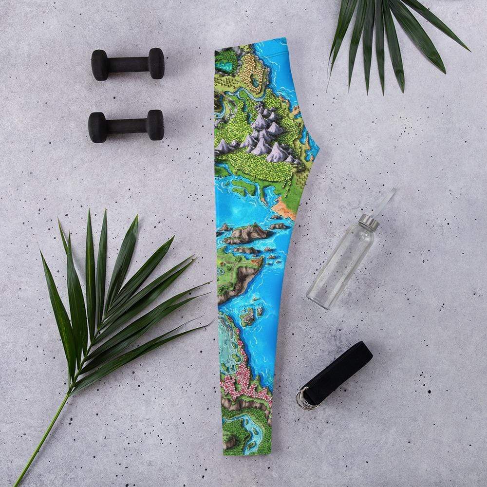 The Taur'Syldor map leggings by Deven Rue lay folded in half with exercise accessories around it.