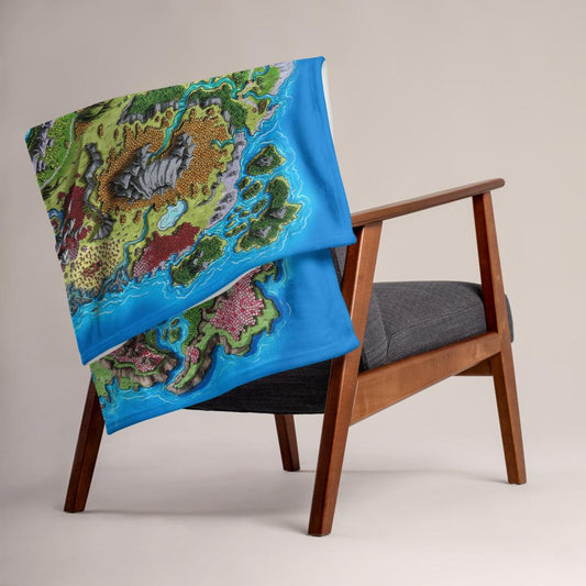 The Taur'Syldor map by Deven Rue is printed on a minky blanket, folded up on the back of a chair.