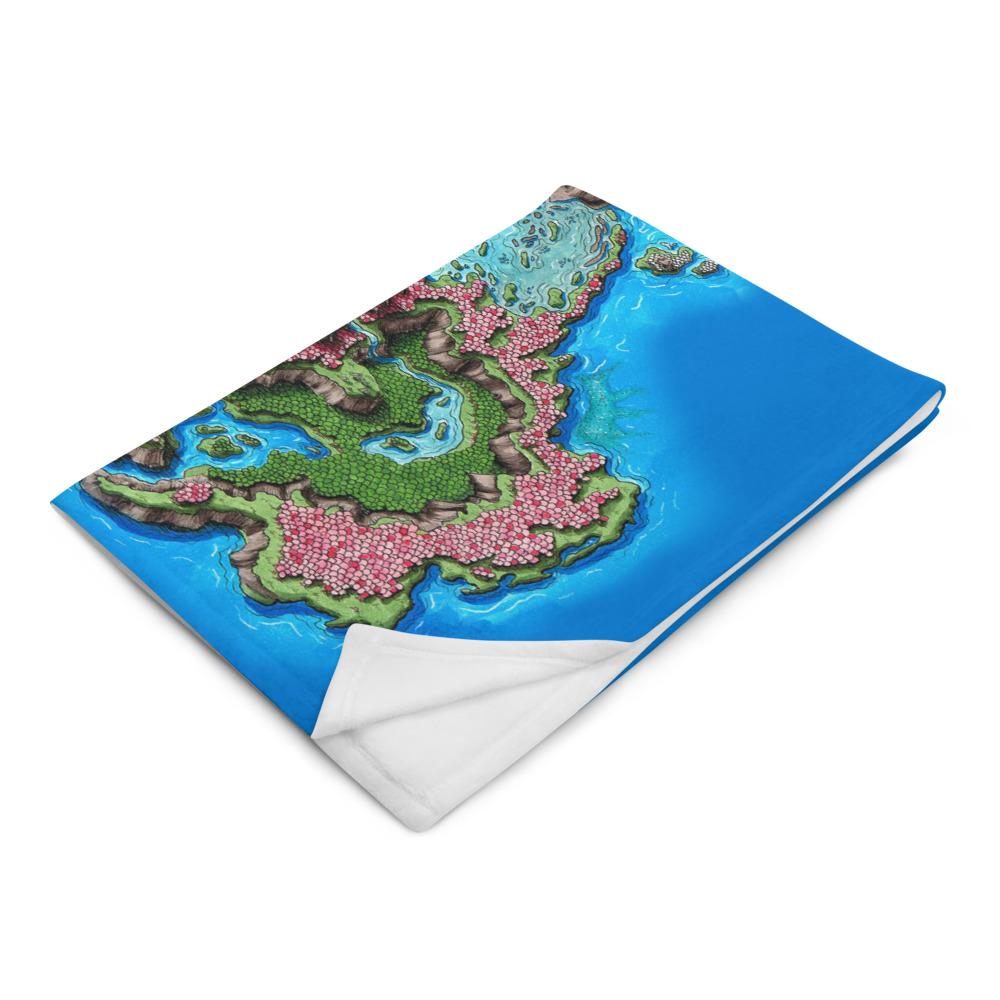 The Taur'Syldor map by Deven Rue is printed on a minky blanket, folded up.