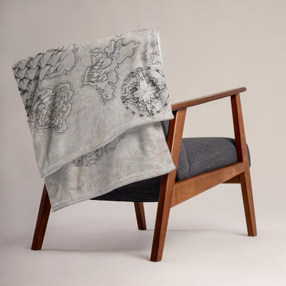 The Wallerfen map by Deven Rue is printed on a minky blanket, folded up on the back of a chair.