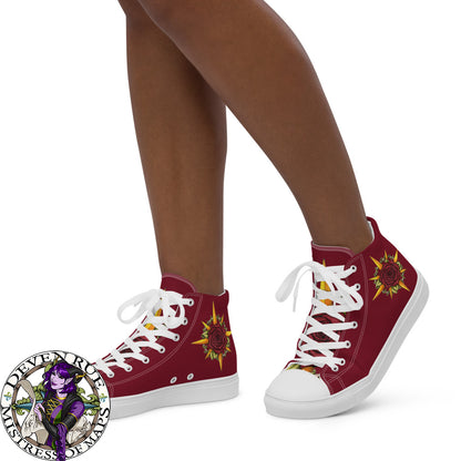 A model wears burgundy high top sneakers with the Druid Compass Rose illustration on the sides and tongues.