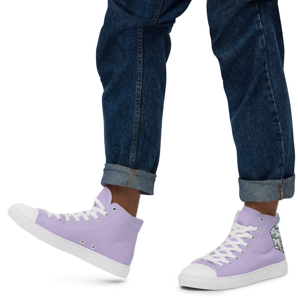 Lavender high top shoes with the Winters Edge hex map by Deven Rue on the heel, worn by a model with rolled up jeans.