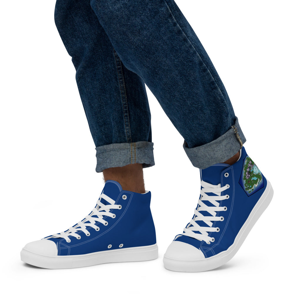 Blue high top shoes with the Skycaller Islands hex map by Deven Rue on the heel, worn by a model with rolled up jeans.