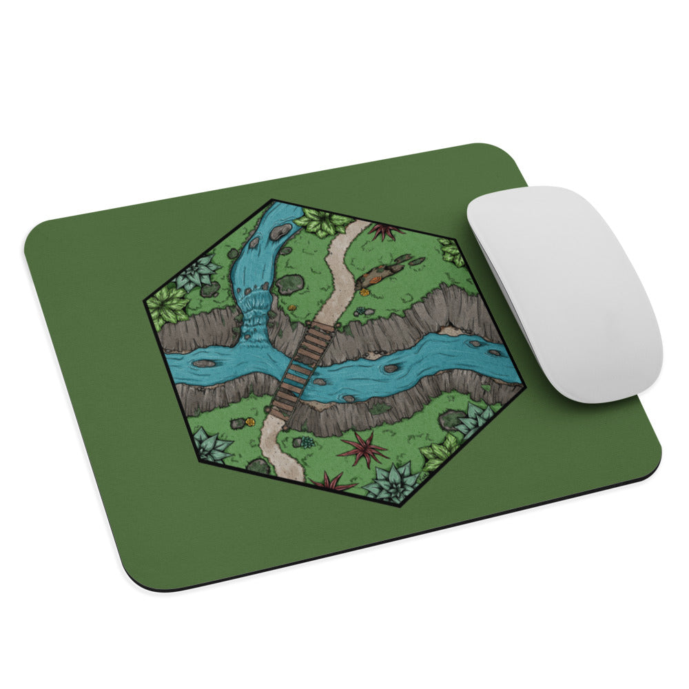 A green mousepad with the Perilous Crossing hex map illustration and a mouse for scale.