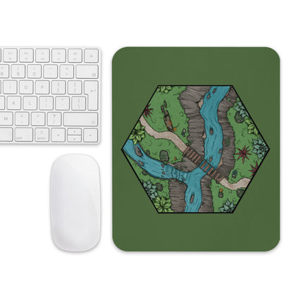 The Perilous Crossing mousepad with a mouse and keyboard for scale.
