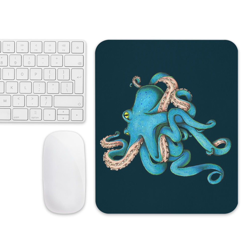 The Tangled Octopus mousepad with a mouse and keyboard for scale.