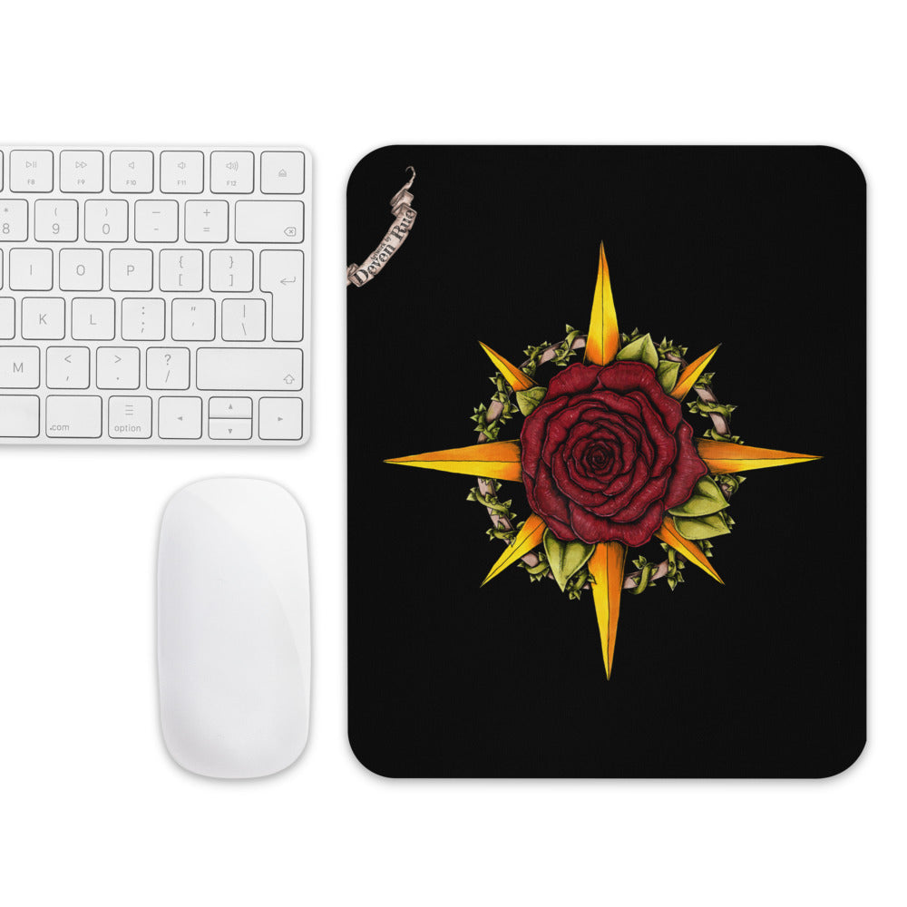 The Druid Compass Rose mousepad with a mouse and keyboard for scale.