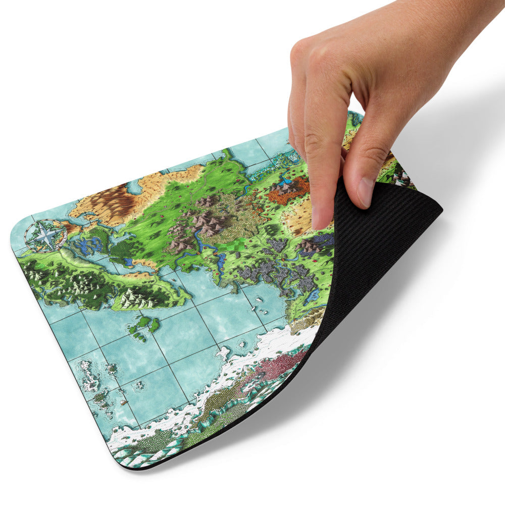 A hand lifts up the corner of the Queen's Treasure mousepad.