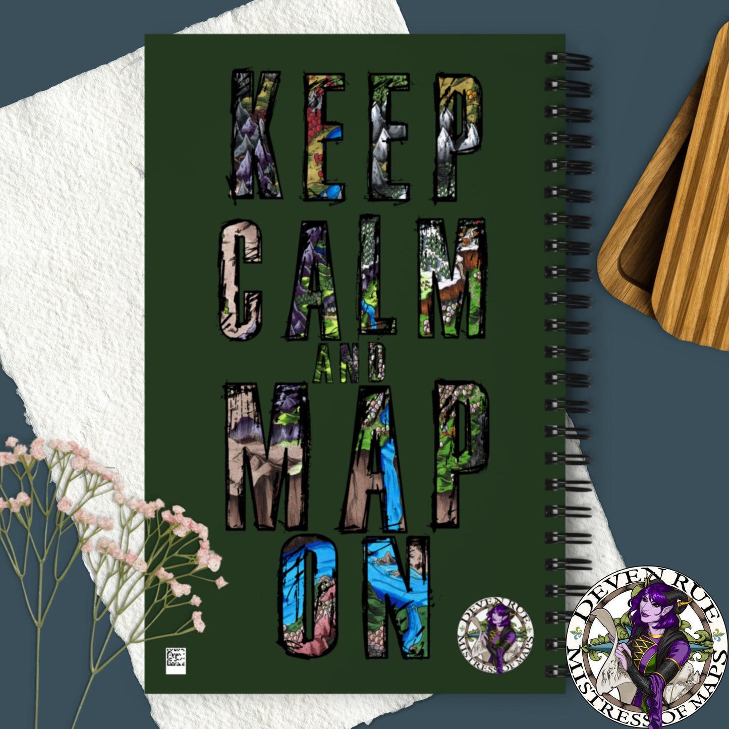 The back of the Keep Calm and Map on notebook with Deven Rue's logo.