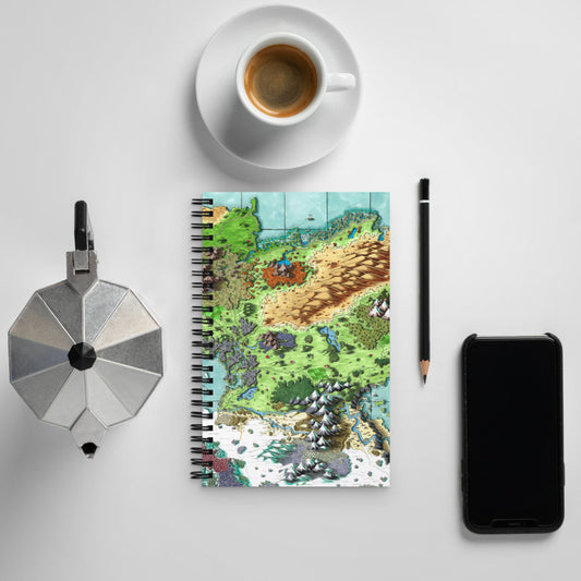 A spiral notebook with the Queen's Treasure map on the front, surrounded by kettle, cup and saucer, pencil, and phone.