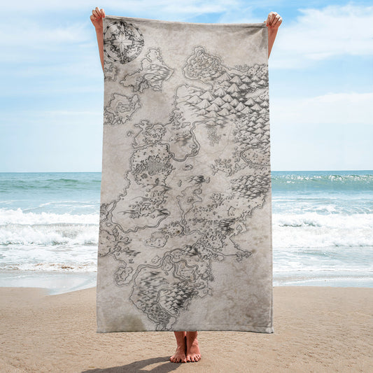 A model holds a towel with the Wallerfen map by Deven Rue at the beach.