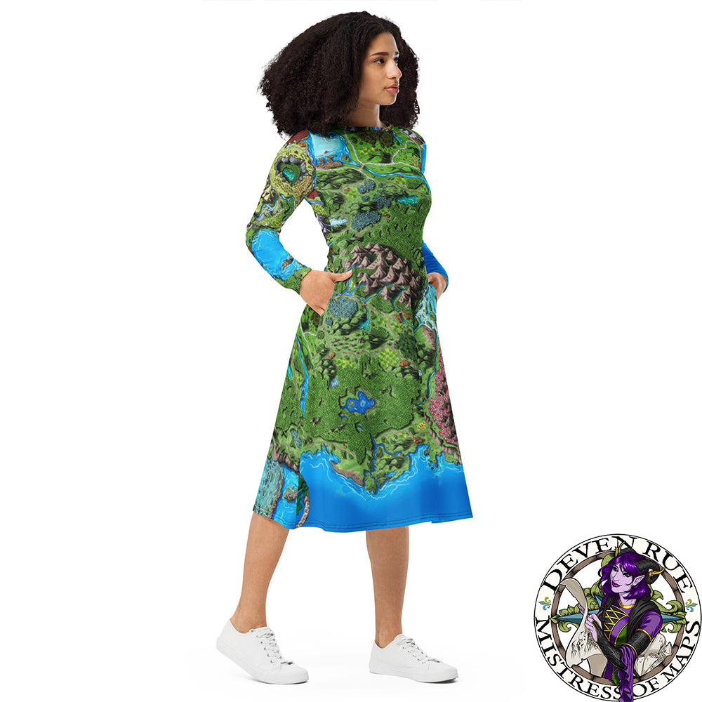 A model wears the Taur'Syldor map on a long sleeve midi dress with a pair of white tennis shoes, hands in their pockets.