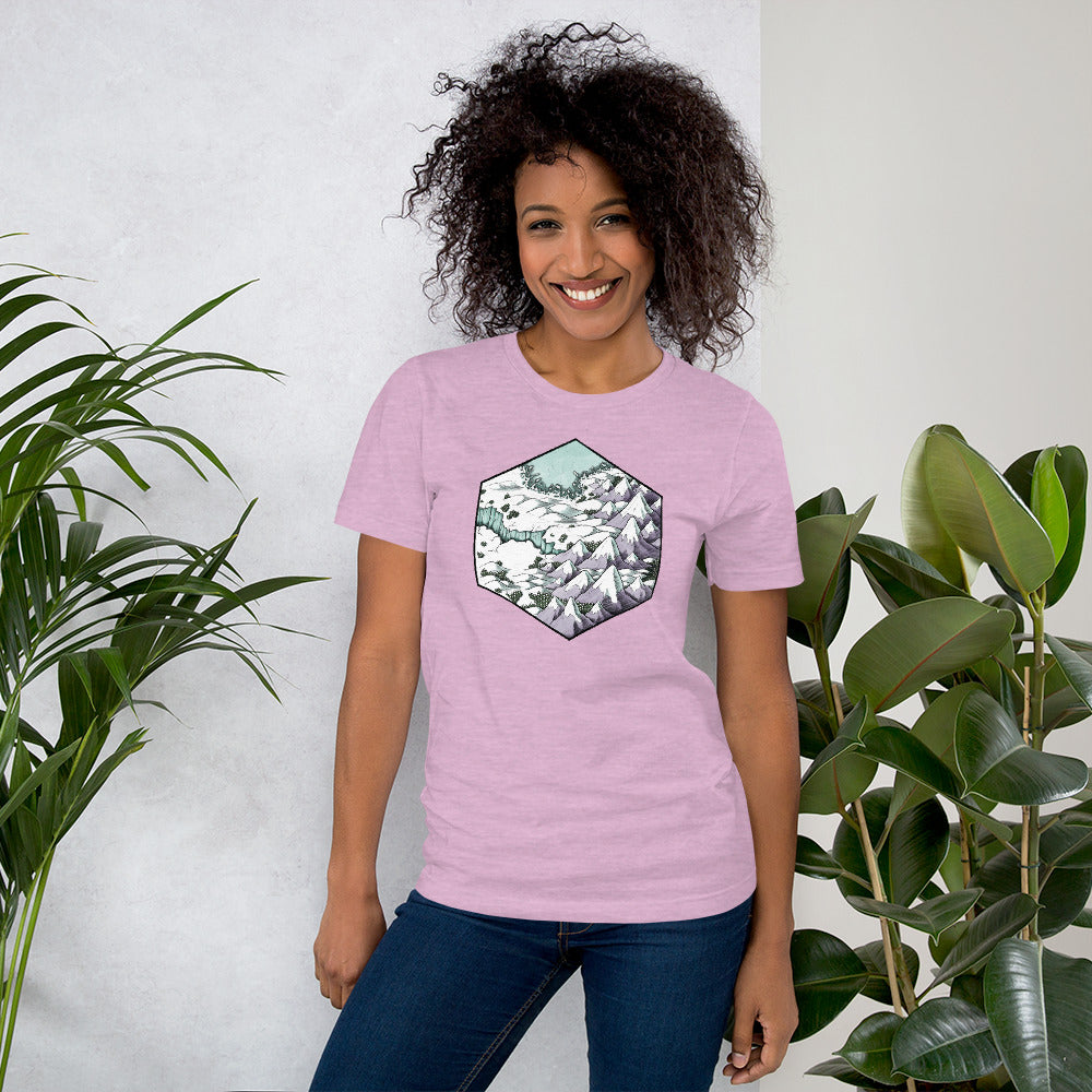 A different model stands among plants wearing the lilac Winter's Edge shirt.
